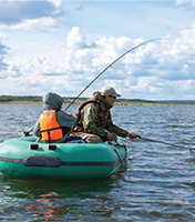 A photo of some anglers in a boat